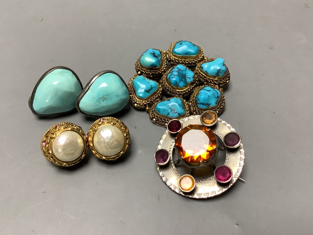 A circular silver gilt and seven-stone turquoise brooch, a pair of silver-mounted clip earrings and a Scottish silver and cairngorm kilt pin